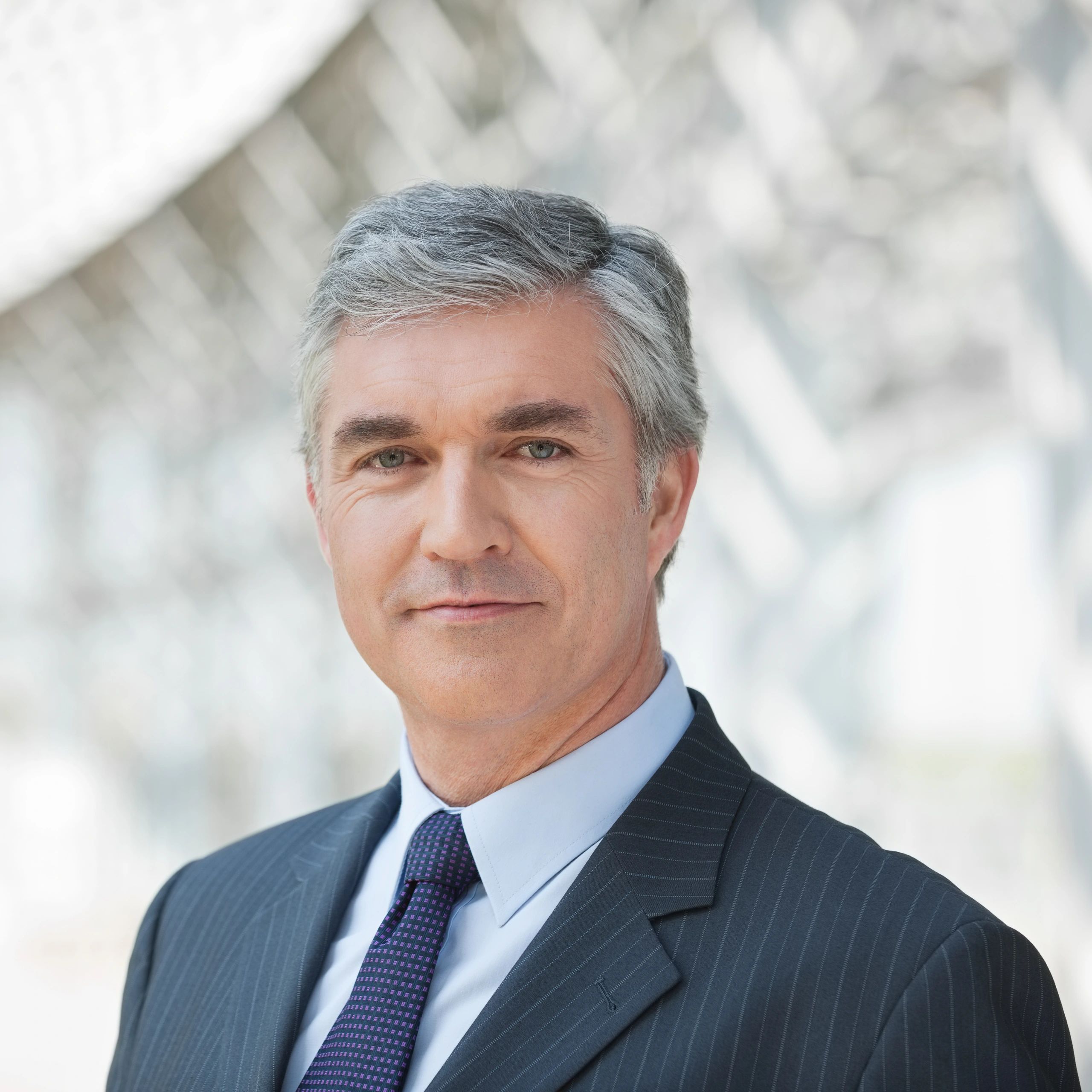 Professional headshot representing a client testimonial