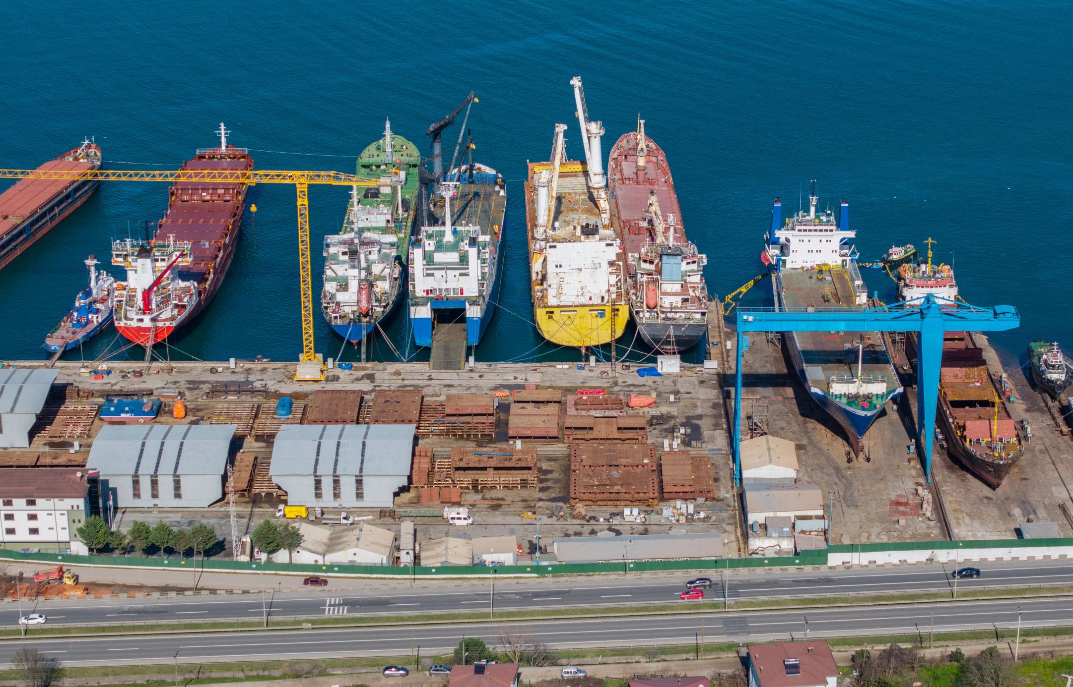 Cargo ships and cranes at an industrial port