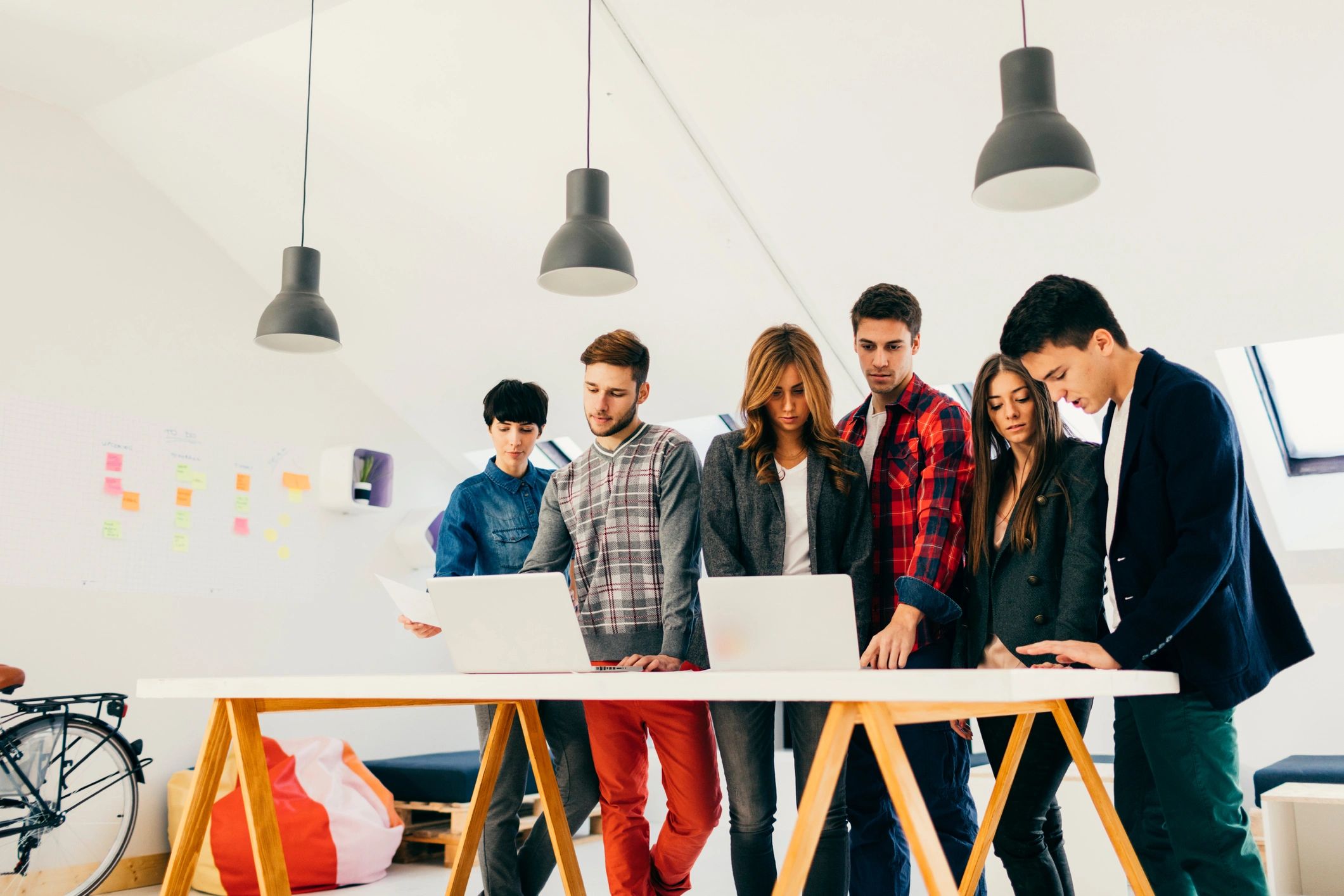IT team collaborating in a modern office